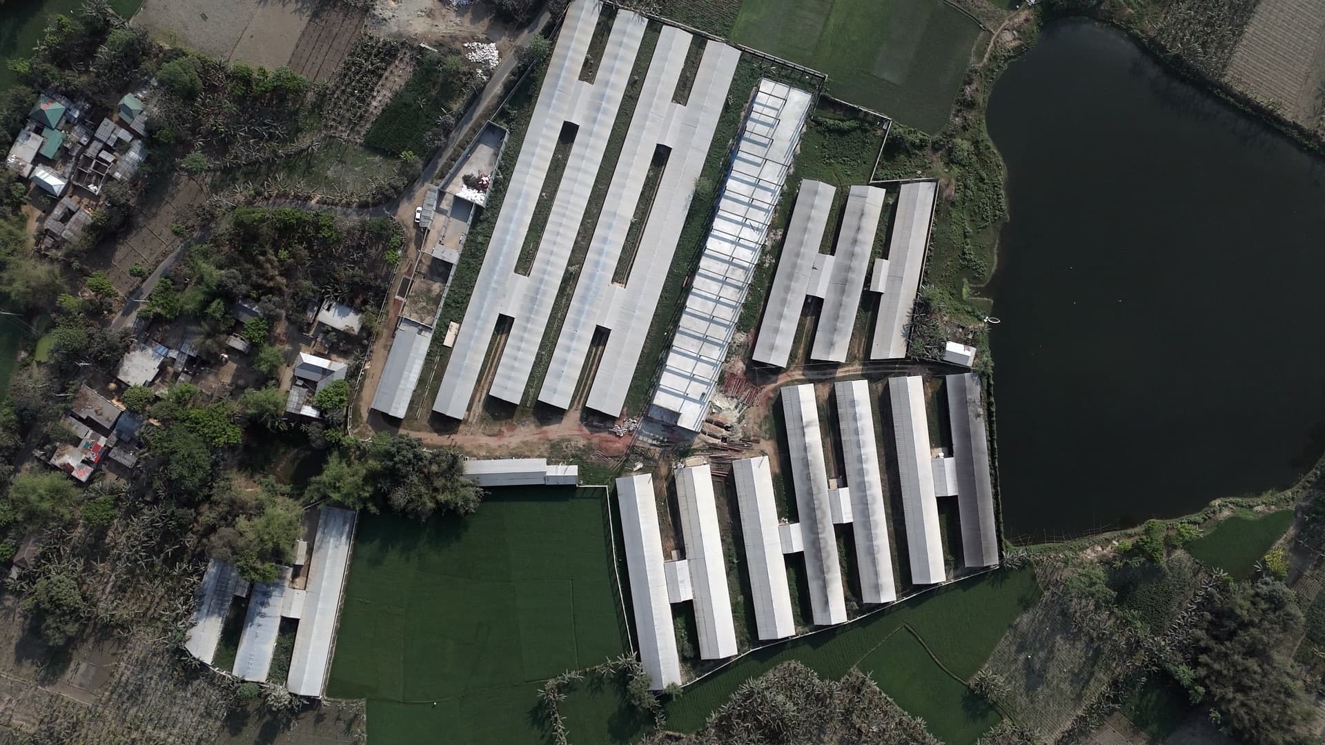 Aerial view of a FreshWay poultry farm amid green fields