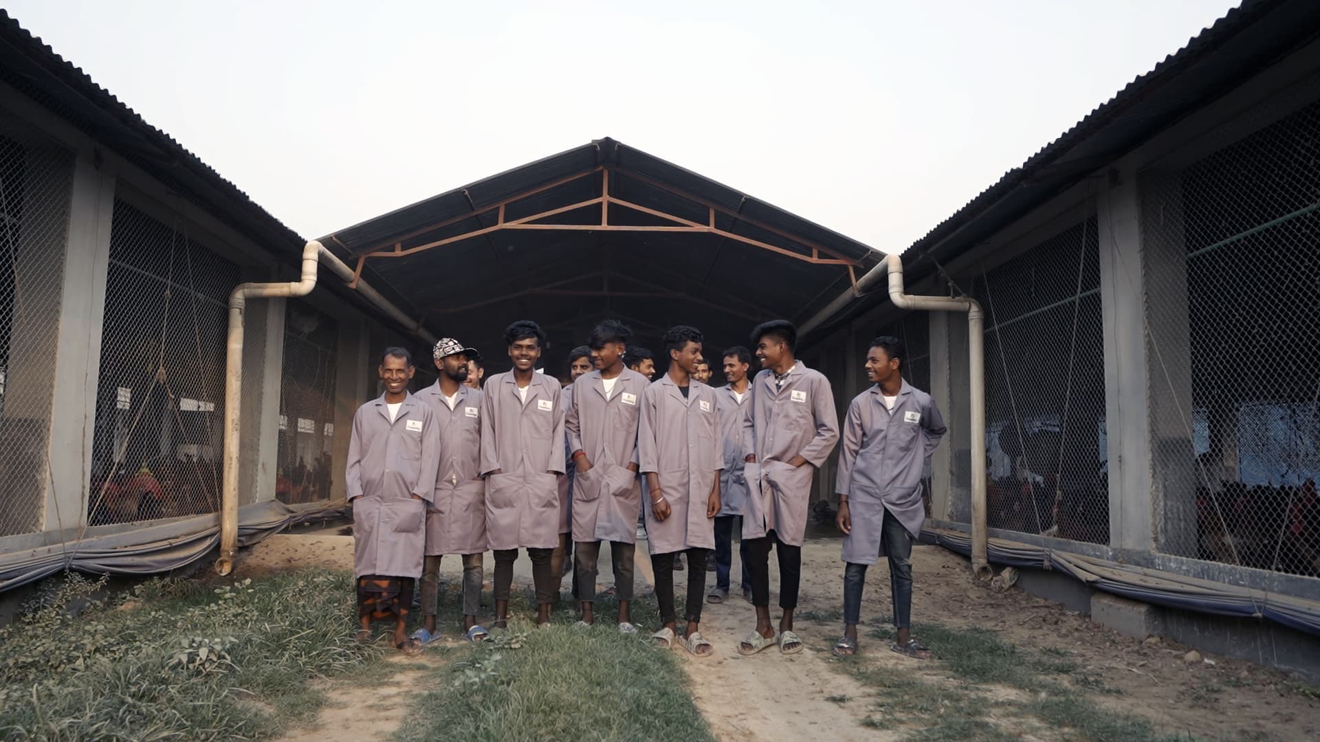 FarmWise field workers at poultry sheds